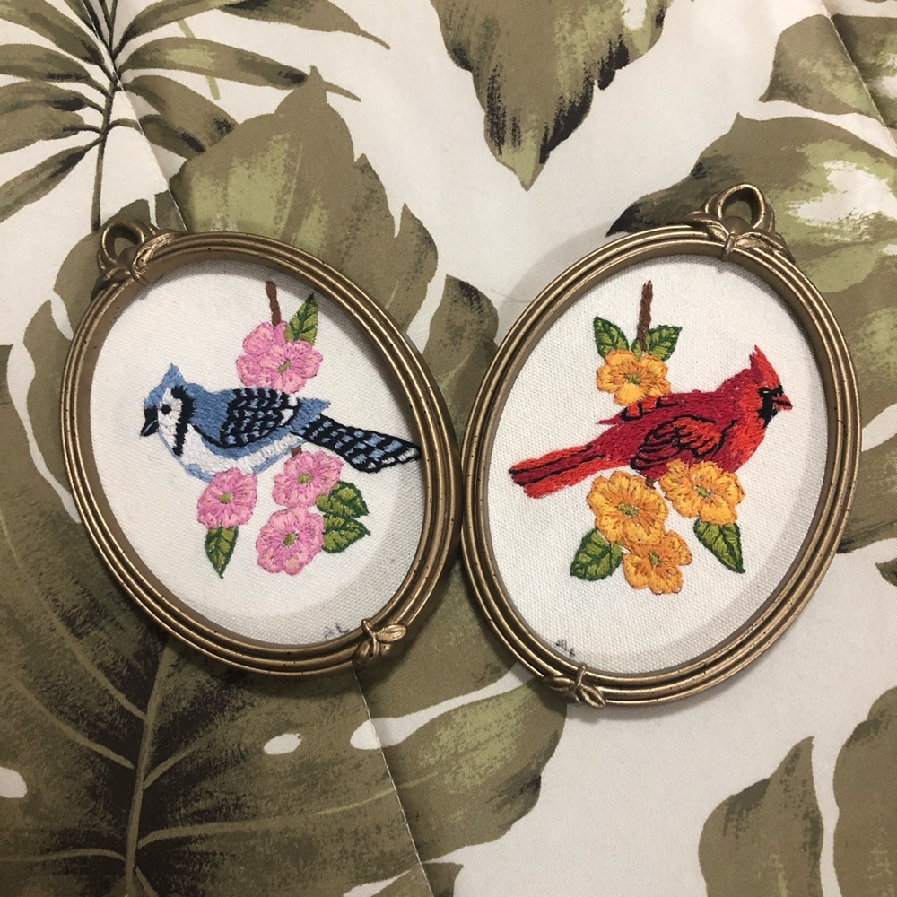 Hand cross stitched birds